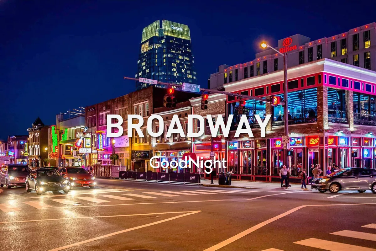 A lively Nashville street scene at night with neon signs, bustling pedestrian activity, and iconic buildings. The street pulses with the excitement of nightlife, live music, and social energy, reflecting the core of the city’s entertainment district.